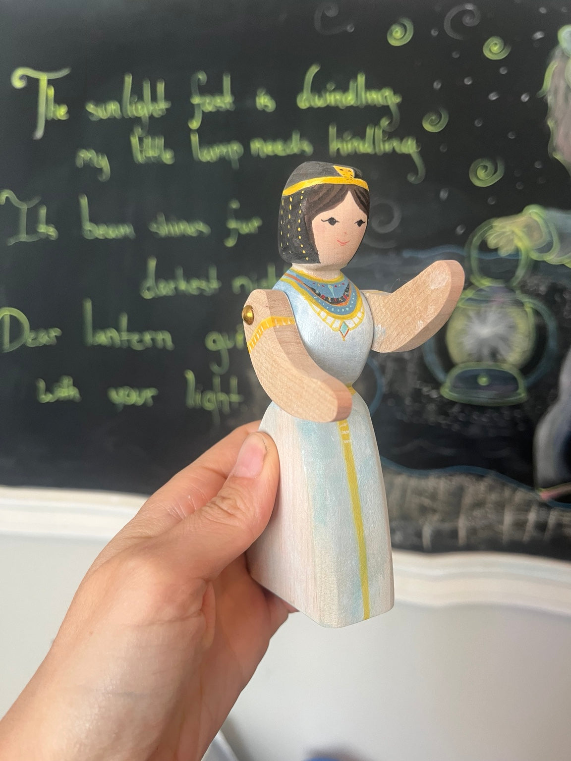 Hand-painted wooden Cleopatra figure in white turquoise and gold
